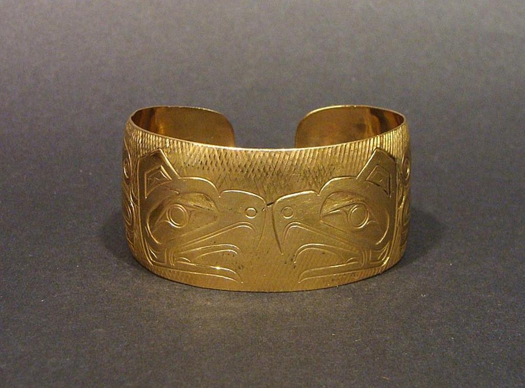 Gordon Cross - a 14kt yellow gold cuff bracelet with Raven design