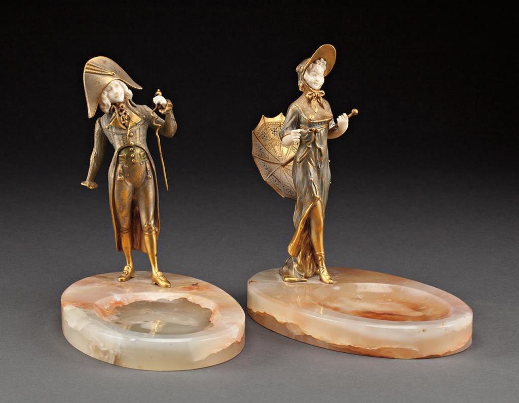 Rene Paul Marquet (1875) - Pair of Art Nouveau gilt bronze and ivory figures mounted on oval vide-poche onyx bases. Each signed