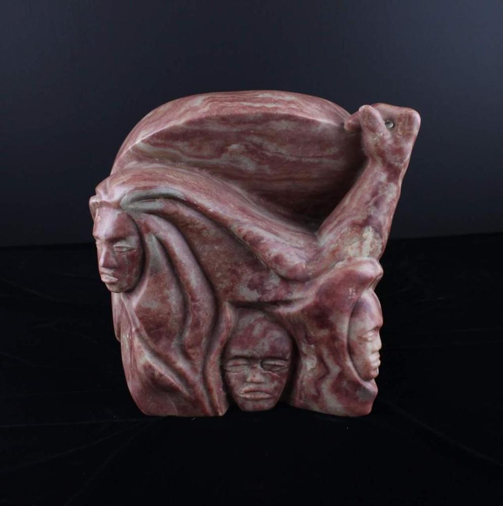 Floyd Grossetete - a rose coloured stone carving of figures