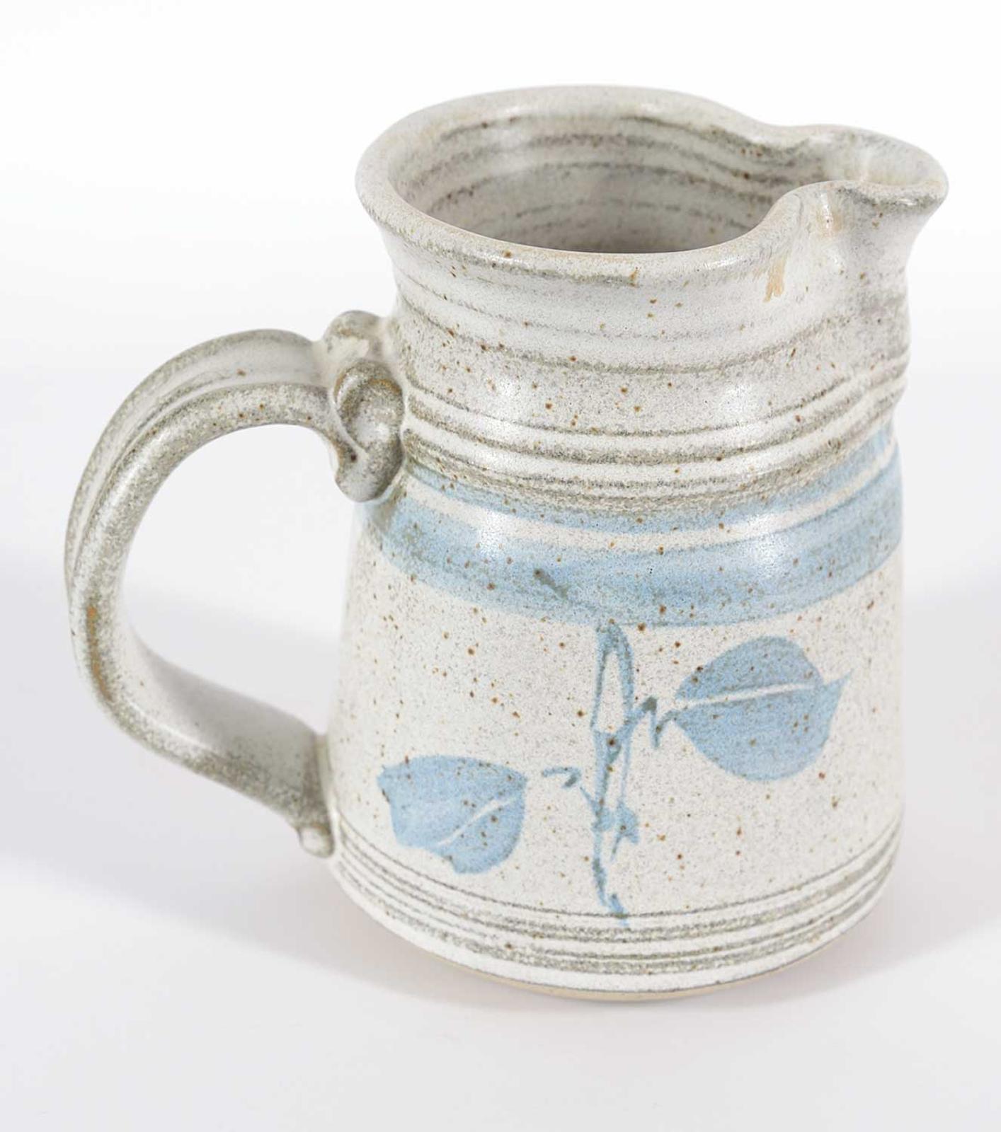 Connie Pike - Pitcher with Blue Leaf Design