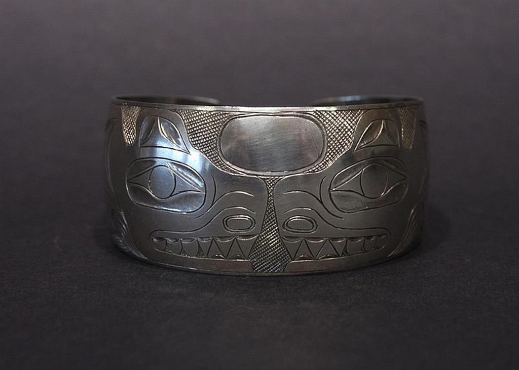 Charles Gladstone - a carved silver cuff bracelet