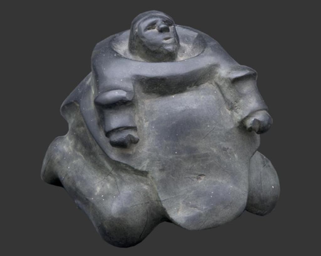 Tuna Iquliq (1935-2015) - Dark green/ black stone carving of a kneeling woman