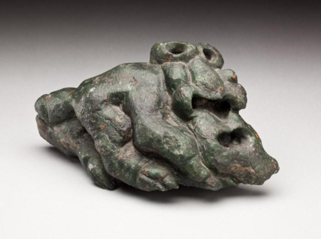Takisunguaq Petersen (1935-1992) - Demonic figure, ca. late 1950s, dark green stone, 4.875 x 10 x 5 in, 12.4 x 25.4 x 12.7 cm
