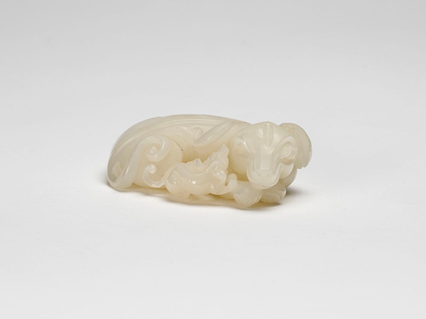 Chinese Art - A Chinese White Jade Carved Dog Group, 20th Century