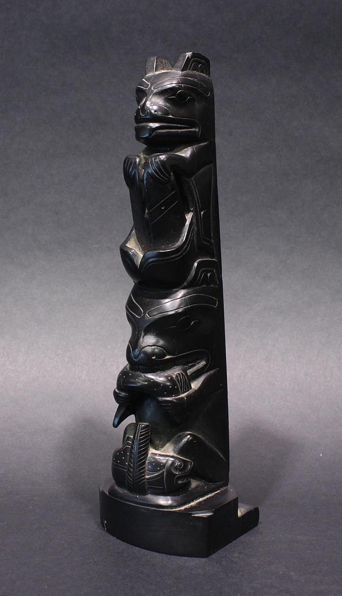 Ike Hans (1899-1961) - a carved argillite pole depicting Sea Bear and Wasco