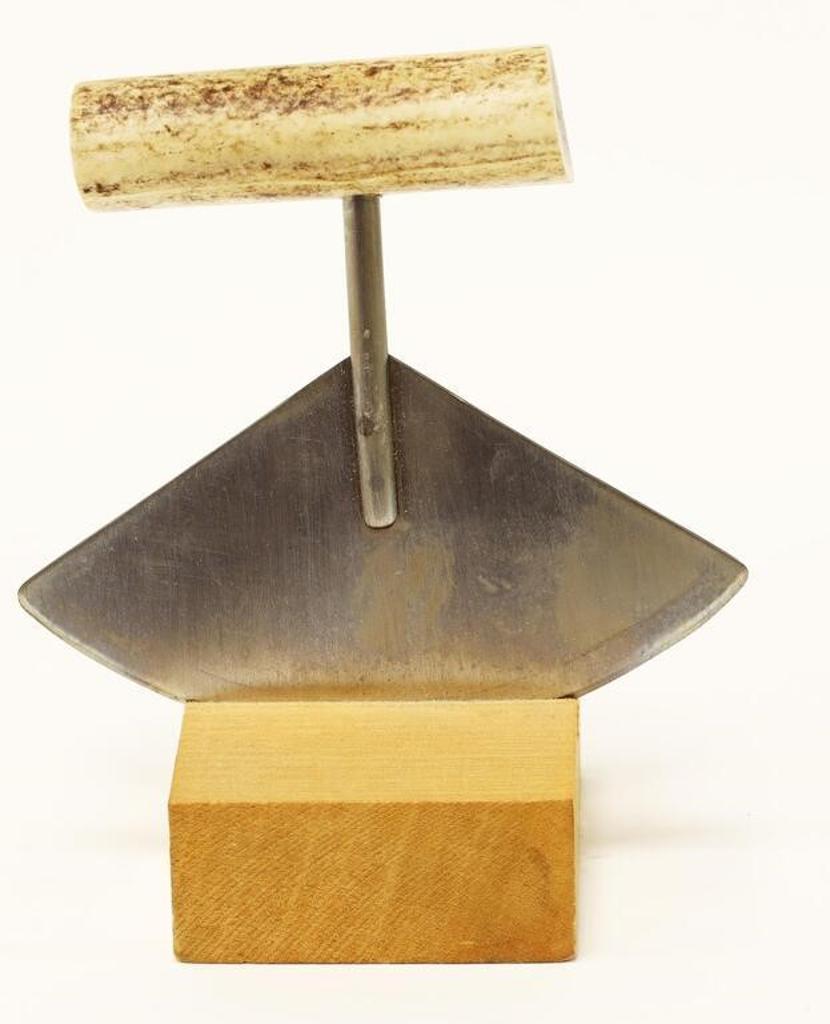 Inuit Ulu - metal blade with antler handle, inserted into a wood block for presentation