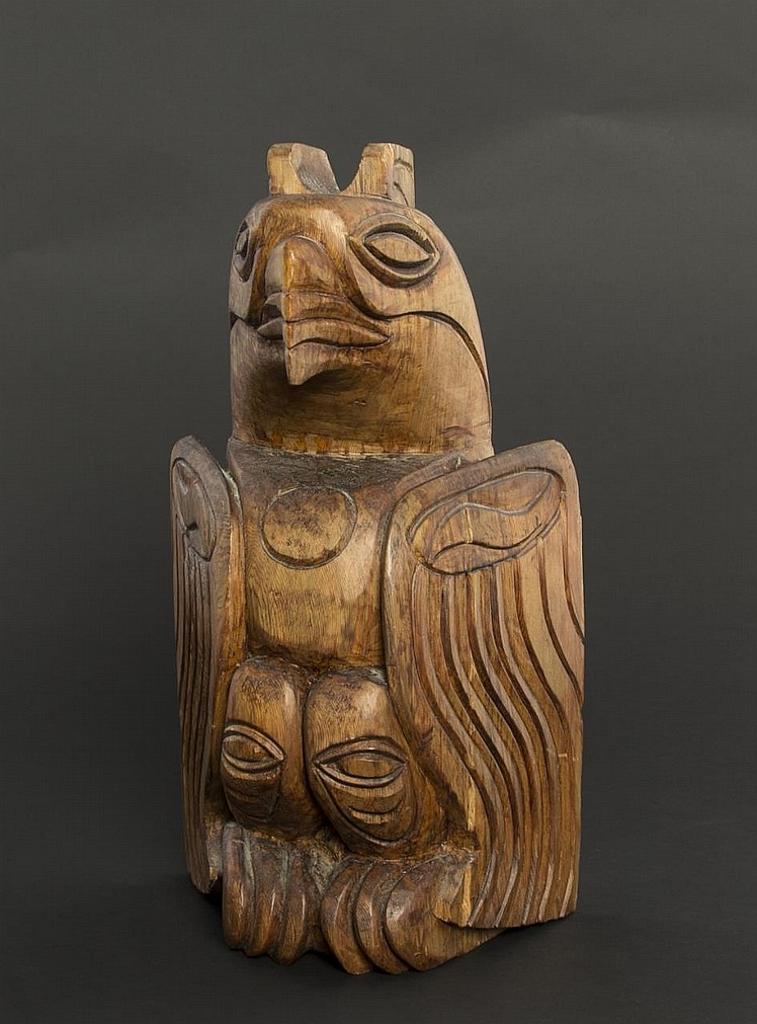 David Nahanee - a carved red cedar pole depicting Raven