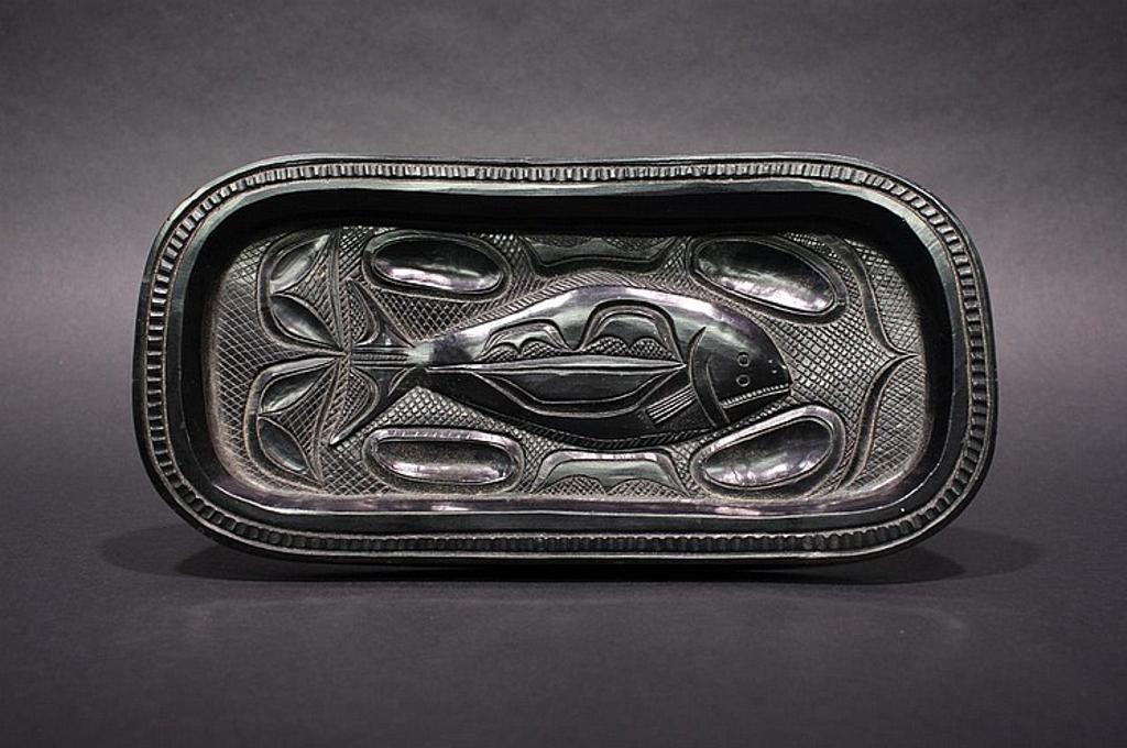Rufus Moody (1923-1998) - an oval argillite plate decorated with Halibut design