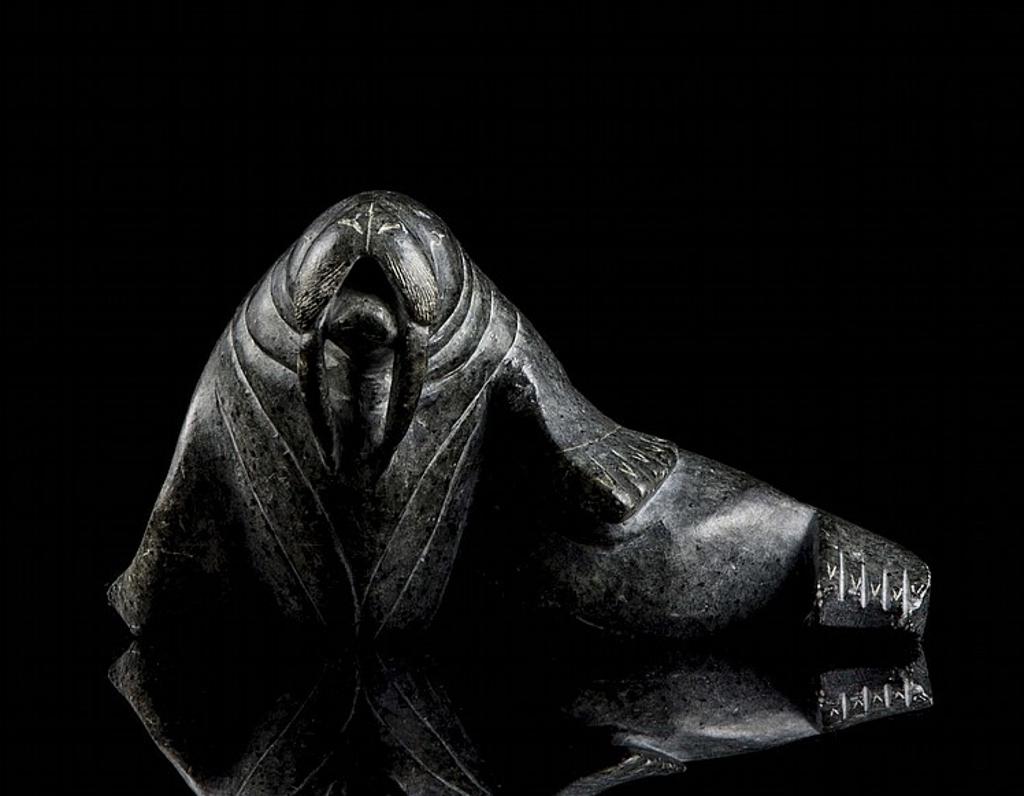 Daniel - a grey stone carving of a walrus