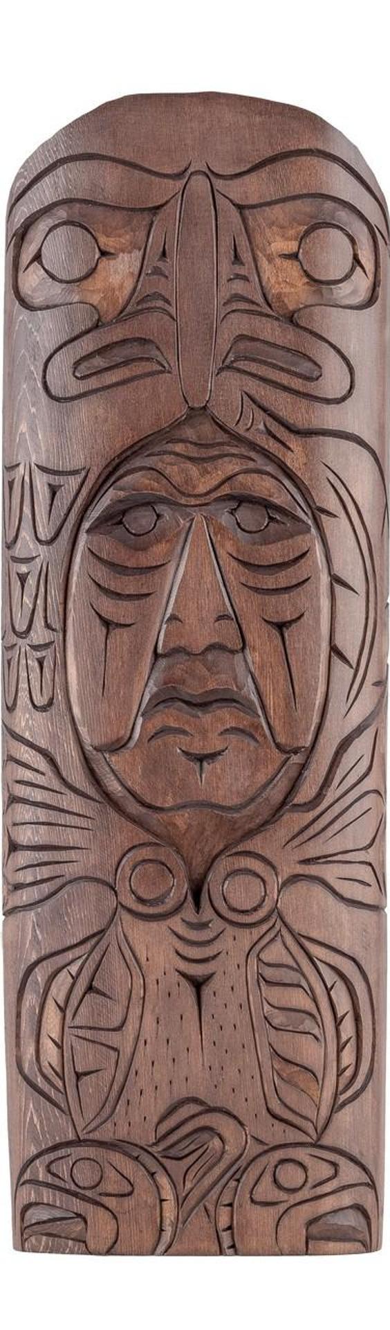 Art Harry - a carved and stained cedar plaque