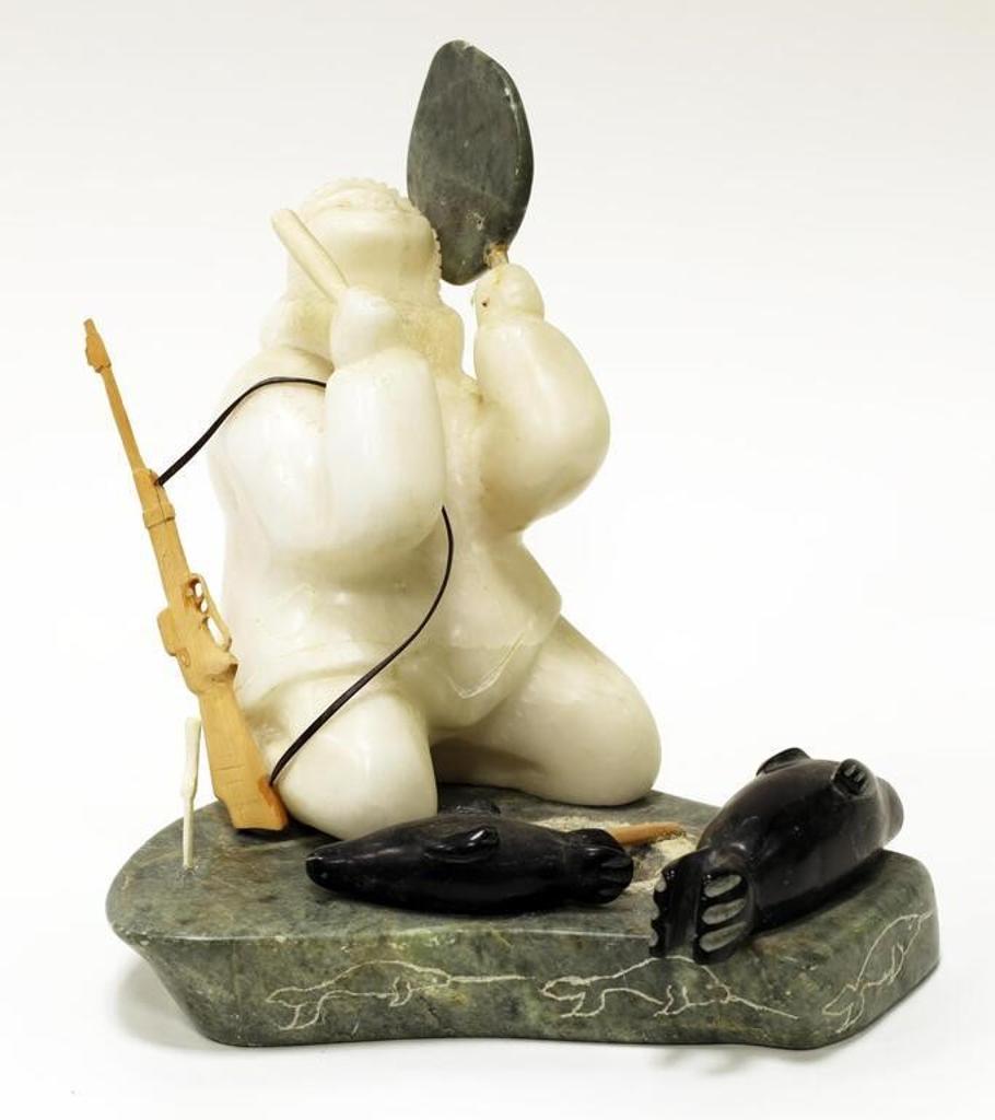 Tom Bourke - an alabaster and black stone Carving of a Seal Hunter with Drum and Beater (bone and serpentine)