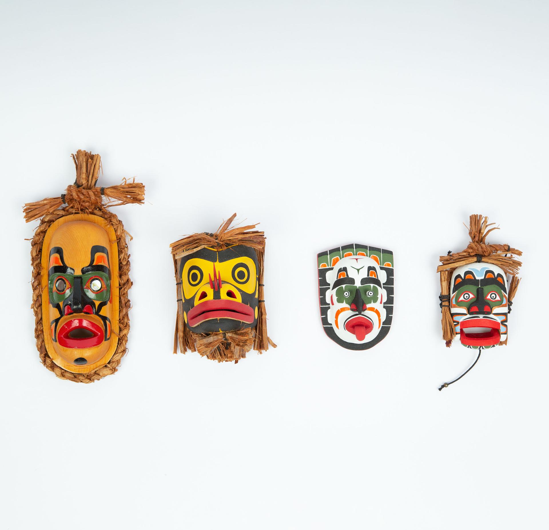 Silas Coon - A Group Of Four Miniature Masks