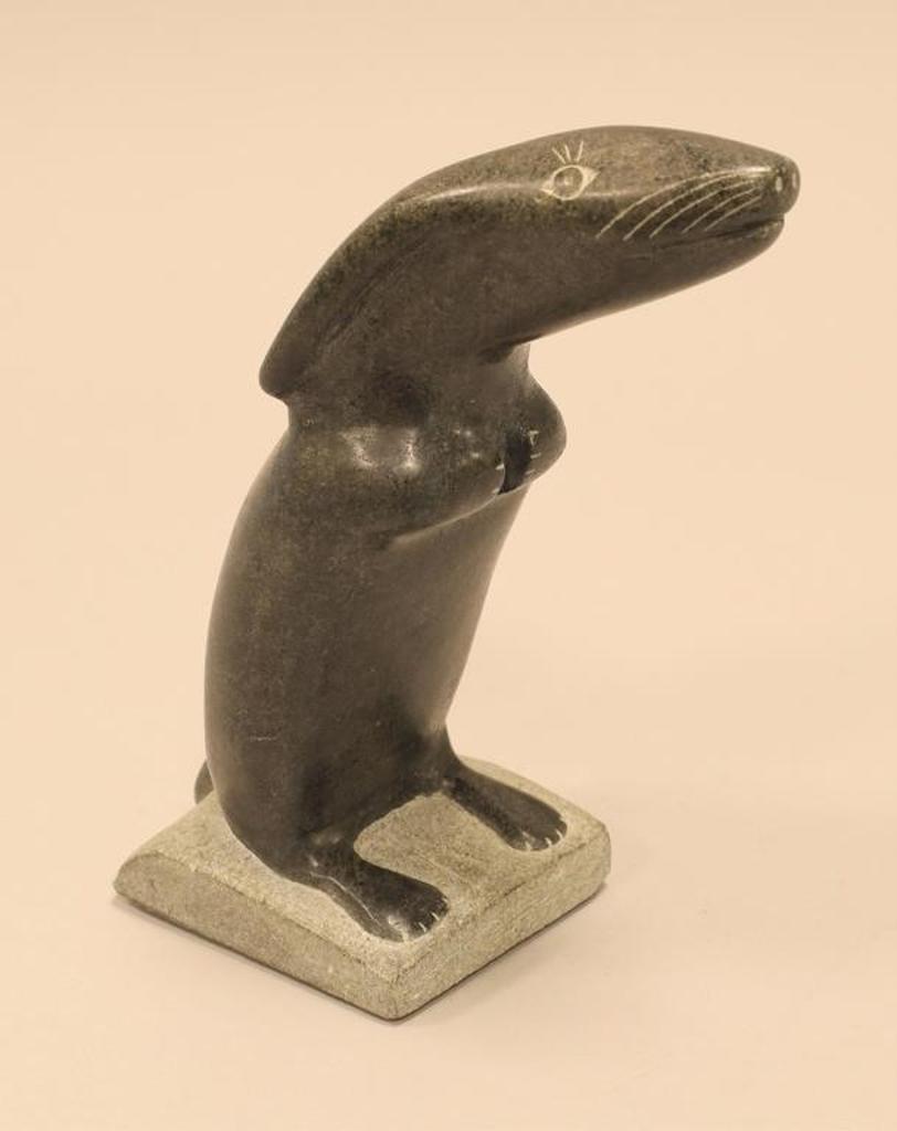 Teevee Tivi - a grey stone carving of a Standing Hare