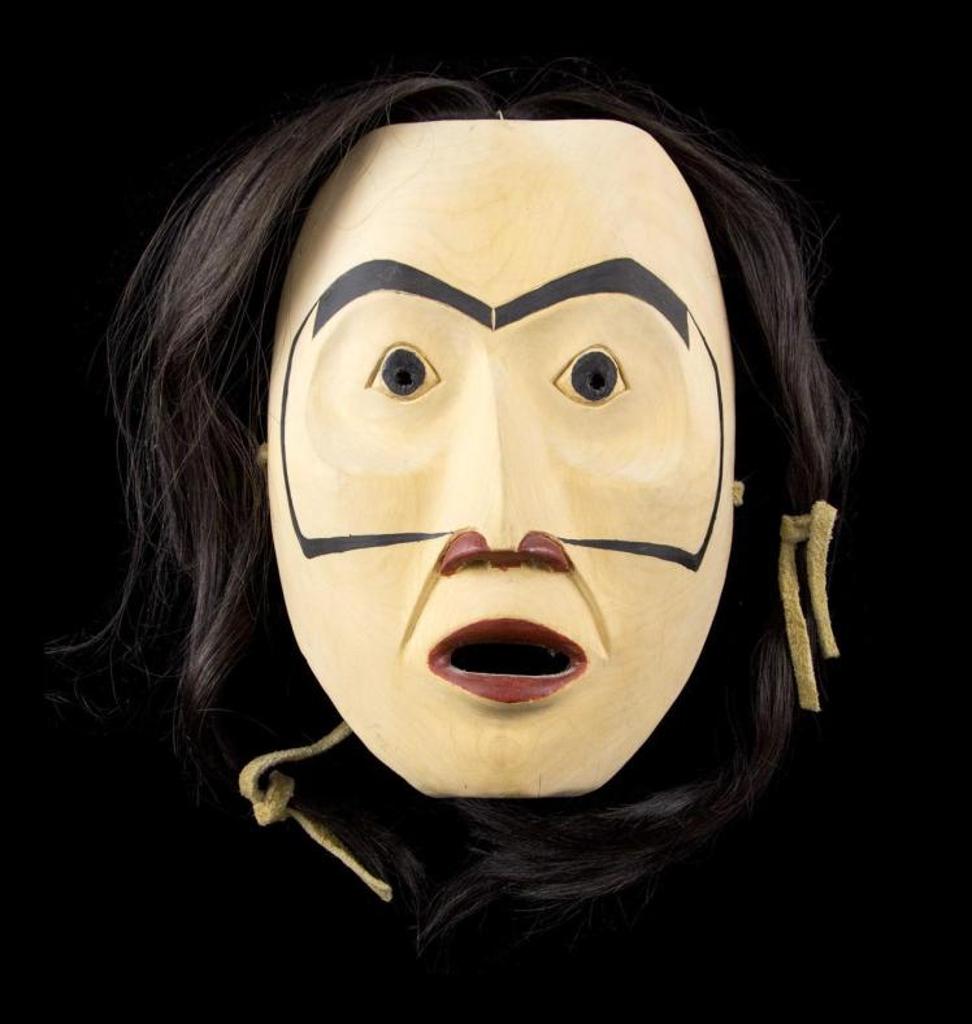 Eric Gray - a carved humanoid mask with horse hair