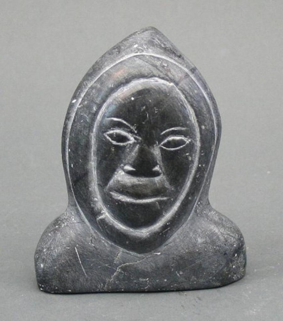Lucy - Carved grey stone bust of a hunter inscribed with disc number
