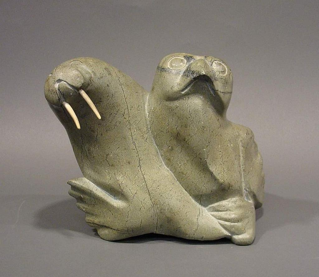 Aqjangajuk (Axangayu) Shaa (1937-2019) - Cape Dorset a serpentine carving of a walrus and owl